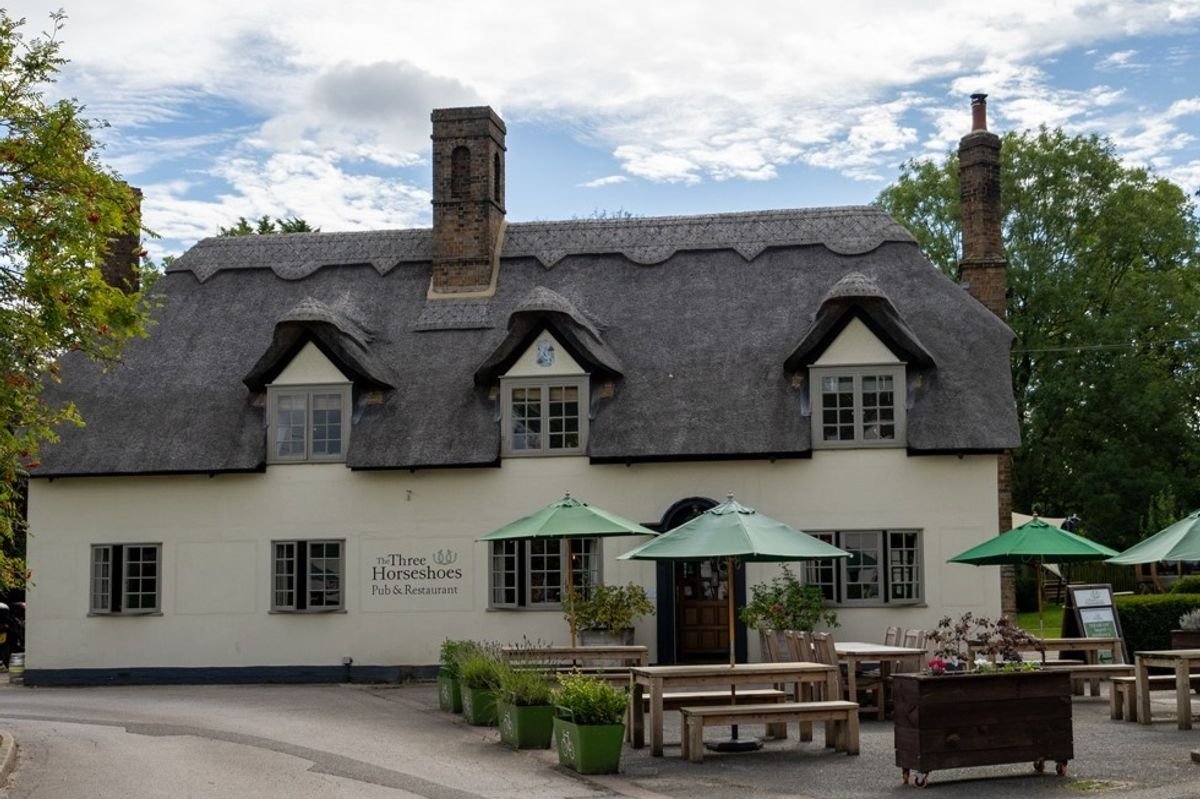 A pub with a pretty beer garden and food described as  'Michelin quality' is located in a 'romantic' Cambridgeshire village