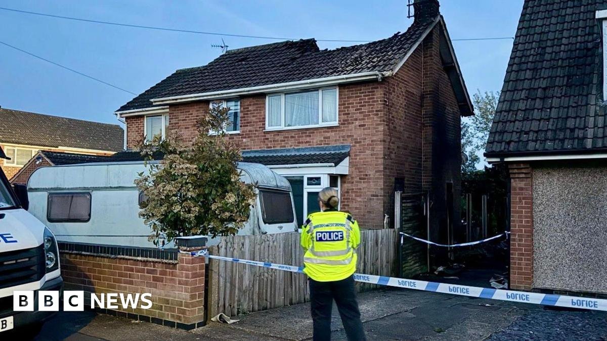 Fire service and police investigate blaze at Leicestershire house