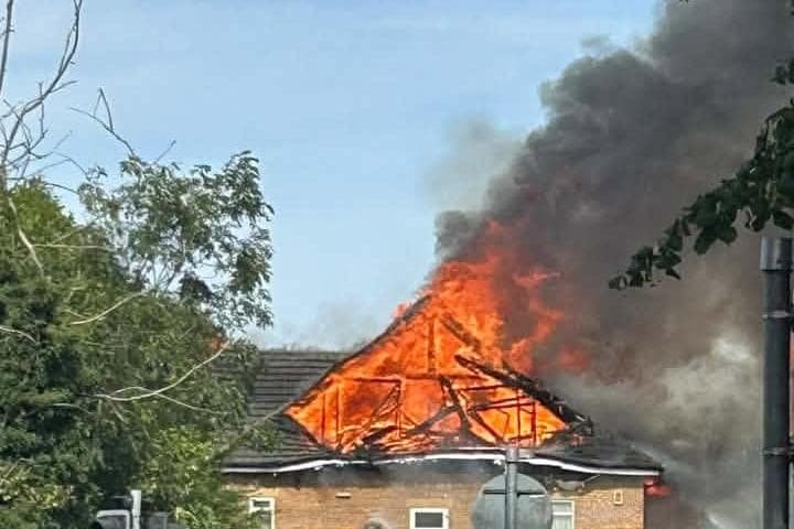 Firefighters battle clubhouse fire at Kingsthorpe Golf Club as flames and smoke billow from roof